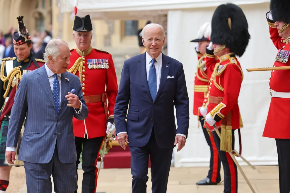 King Charles and President of the United States, Joe Biden inspect the Guard of Honour formed by The Prince of Wales's Company of the Welsh Guards at Windsor Castle on July 10, 2023, in Windsor, England. Chris Jackson/Pool via REUTERS USA-BIDEN/BRITAIN-WINDSOR