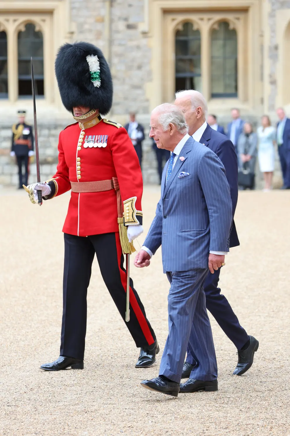 King Charles and The President of the United States, Joe Biden on stage as a Guard of Honour formed of The Prince of Wales?s Company of the Welsh Guards march past in the Quadrangle at Windsor Castle on July 10, 2023, in Windsor, England. Chris Jackson/Pool via REUTERS USA-BIDEN/BRITAIN-WINDSOR