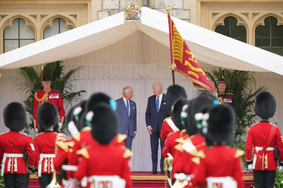 U.S. President Joe Biden and Britain's King Charles turn having inspected the Guard of Honour formed by the Welsh Guards, during a ceremonial welcome in the Quadrangle at Windsor Castle in Windsor on July 10, 2023.  Sgt Donald C Todd/Pool via REUTERS USA-BIDEN/BRITAIN-WINDSOR
