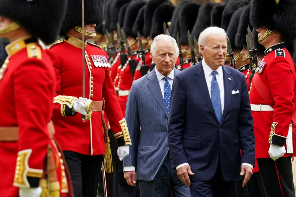 King Charles and U.S. President Joe Biden inspect the Guard of Honour from the Prince of Wales's Company of the Welsh Guards, in the quadrangle at Windsor Castle, Berkshire, during President Biden's visit to the UK. Picture date: Monday, July 10, 2023. Jonathan Brady/Pool via REUTERS USA-BIDEN/BRITAIN-WINDSOR