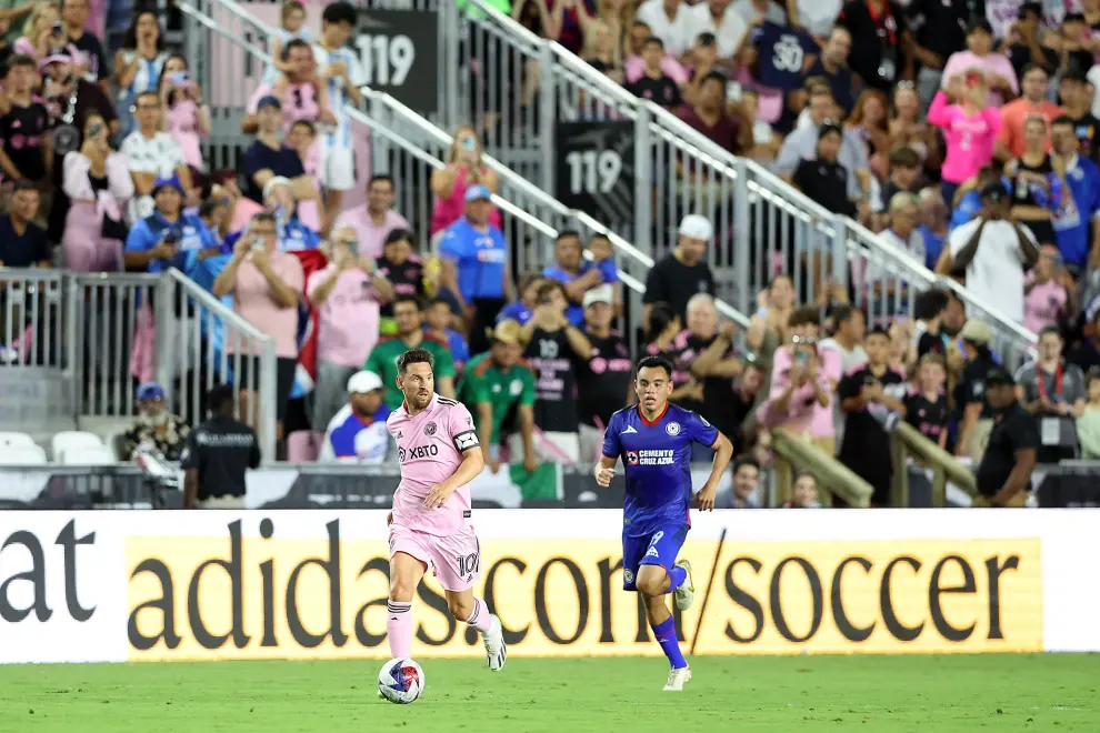 Jul 21, 2023; Fort Lauderdale, FL, USA; Inter Miami CF forward Lionel Messi (10) in action with Cruz Azul defender Carlos Salcedo (3) during the second half at DRV PNK Stadium. Mandatory Credit: Nathan Ray Seebeck-USA TODAY Sports SOCCER-USA/