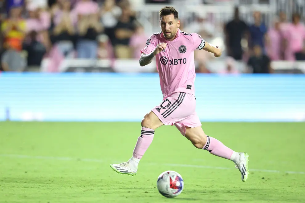Jul 21, 2023; Fort Lauderdale, FL, USA; Inter Miami CF forward Lionel Messi (10) moves in for a shot on goal agianst Cruz Azul midfielder Ignacio Rivero (15) and goalkeeper Andres Gudino (30) during the second half at DRV PNK Stadium. Mandatory Credit: Nathan Ray Seebeck-USA TODAY Sports SOCCER-USA/