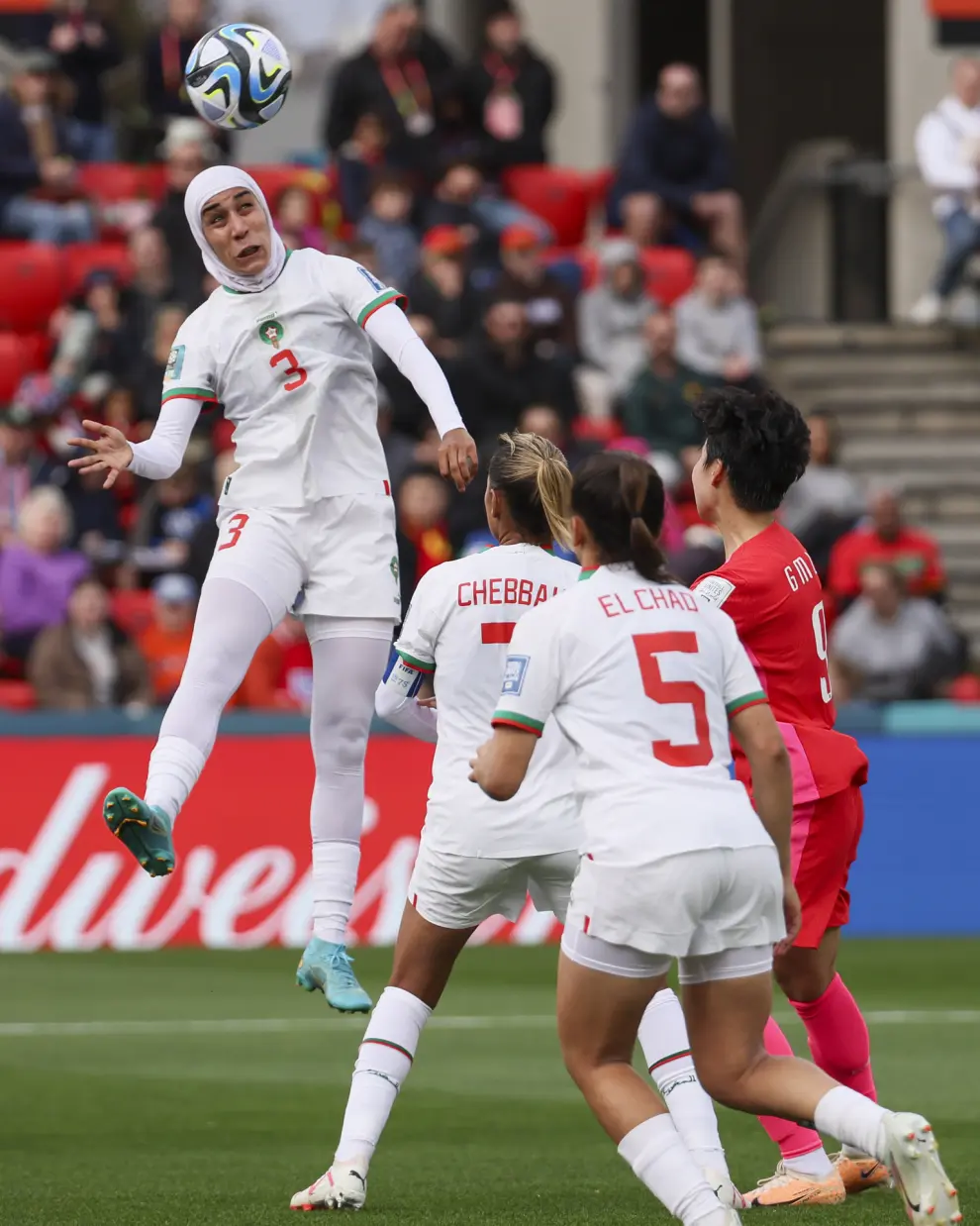 Morocco's Nouhaila Benzina heads the ball during the Women's World Cup Group H soccer match between South Korea and Morocco in Adelaide, Australia, Sunday, July 30, 2023. (AP Photo/James Elsby)