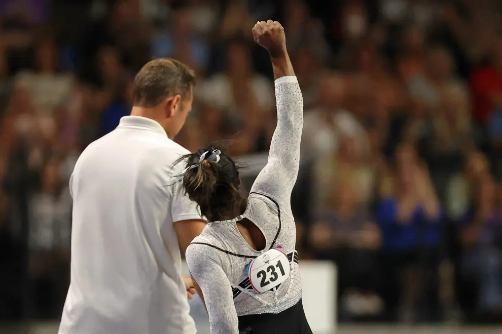 Aug 5, 2023; Hoffman Estates, Illinois, USA; Simone Biles is congratulated by Jordan Chiles after her vault during the Core Hydration Classic at NOW Arena. Mandatory Credit: Jon Durr-USA TODAY Sports GYMNASTICS/