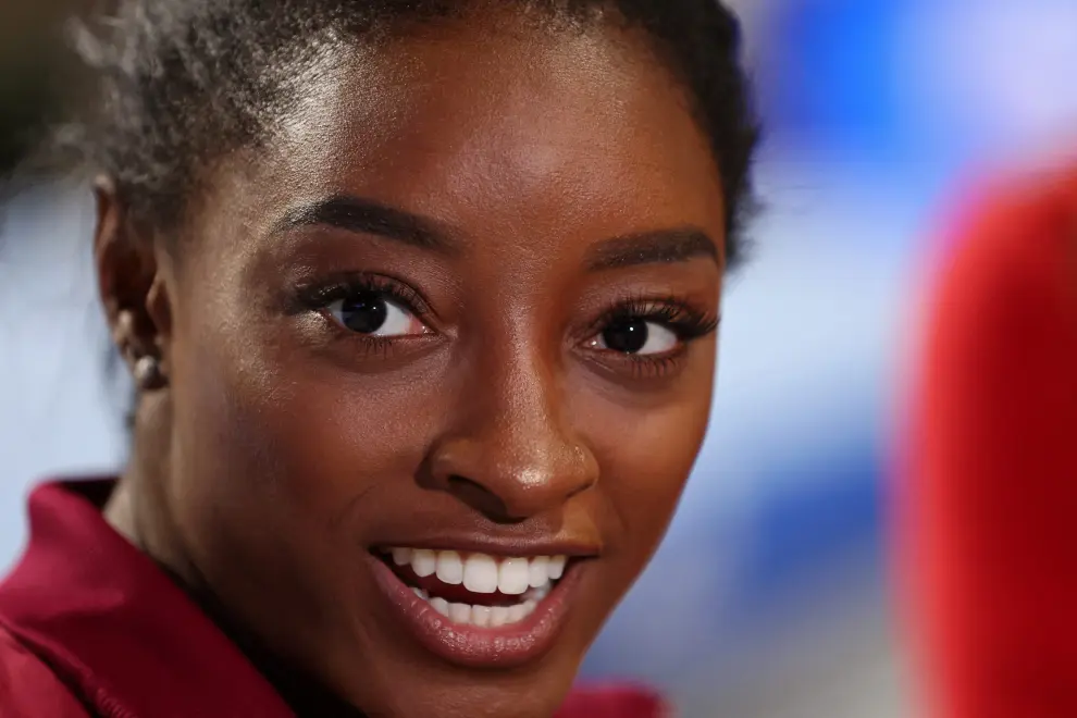 Aug 5, 2023; Hoffman Estates, Illinois, USA; A detail view of the earrings worn by Simone Biles as she talks to the media after winning the all-around in the Core Hydration Classic at NOW Arena. Mandatory Credit: Jon Durr-USA TODAY Sports GYMNASTICS/