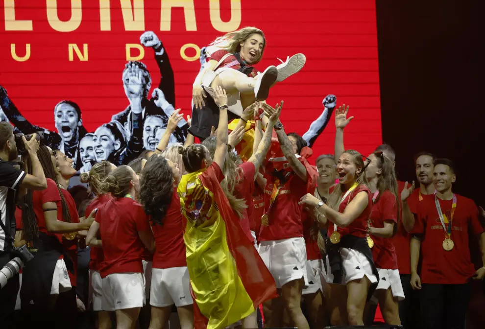 Soccer Football - FIFA Women's World Cup Australia and New Zealand 2023 - Spain arrive in Madrid after winning the Final - Madrid, Spain - August 22, 2023 Spain's Olga Carmona is tossed by teammates during the celebrations after winning the FIFA Women's World Cup REUTERS/Juan Medina