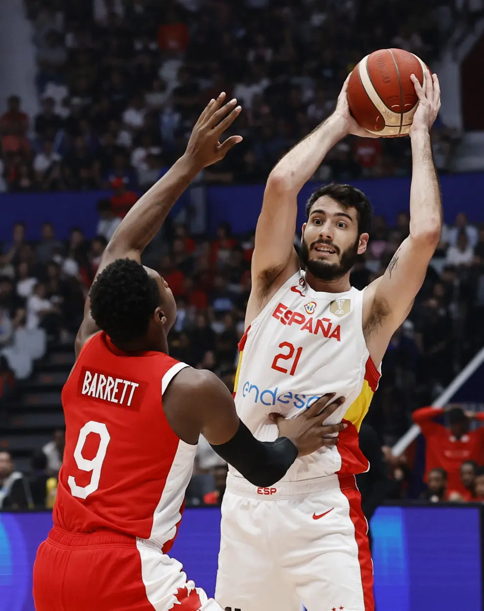 Basketball - FIBA World Cup 2023 - Second Round - Group L - Spain v Canada  - Indonesia Arena, Jakarta, Indonesia - September 3, 2023 Spain's Willy Hernangomez in action with Canada's Dillon Brooks REUTERS/Willy Kurniawan BASKETBALL-WORLDCUP-ESP-CAN/