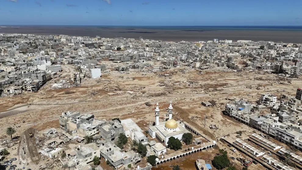 A general view of the flooded city of Derna, Libya, is seen Wednesday, Sept. 13, 2023. The rainwater that gushed down Derna's mountainside and into the city has killed thousands and left thousands more missing, washing entire neighborhoods out to sea. AP Photo/Muhammad J. Elalwany)