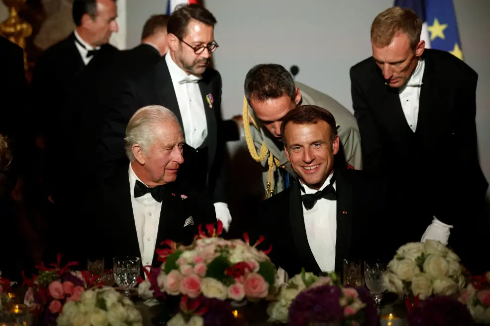 French President Emmanuel Macron toasts with Britain's King Charles during a state banquet at the Palace of Versailles, west of Paris, on September 20, 2023, on the first day of a British royal state visit to France. DANIEL LEAL/Pool via REUTERS BRITAIN-ROYALS/FRANCE