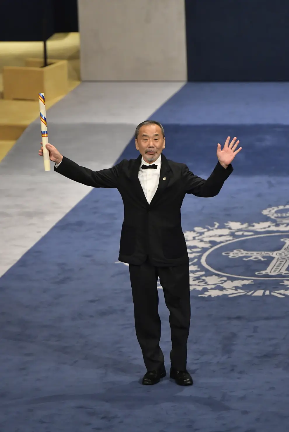 Japanese author Haruki Murakami reacts after receiving the Princess of Asturias Award for Literature during the awards ceremony in Oviedo, northern Spain, Friday, Oct. 20, 2023. The awards, named after the heir to the Spanish throne, are among the most important in the Spanish-speaking world. (AP Photo/Alvaro Barrientos)