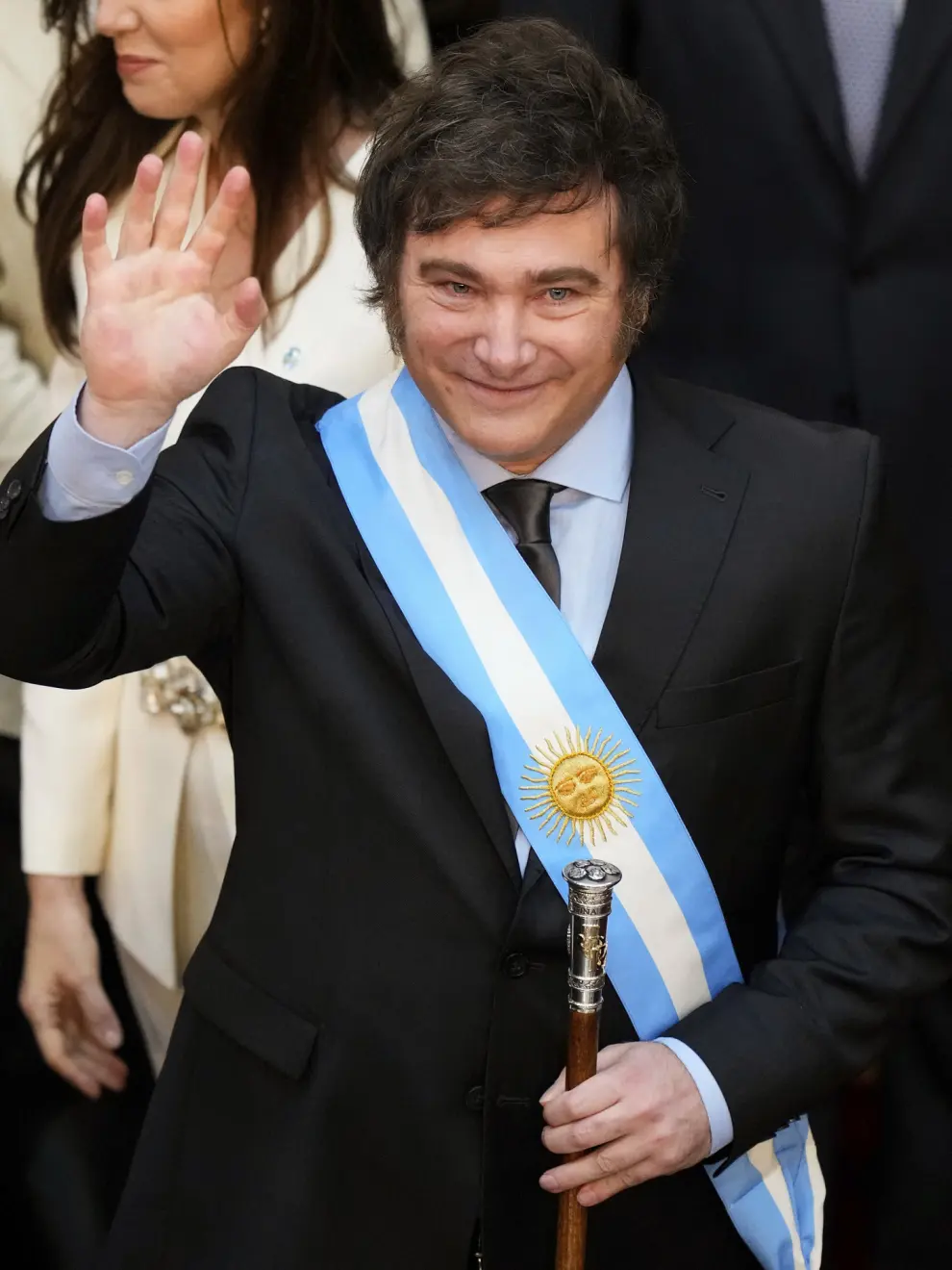 Argentina's incoming President Javier Milei waves after his swearing-in ceremony at the Congress in Buenos Aires, Argentina, Sunday, Dec. 10, 2023. (AP Photo/Natacha Pisarenko)