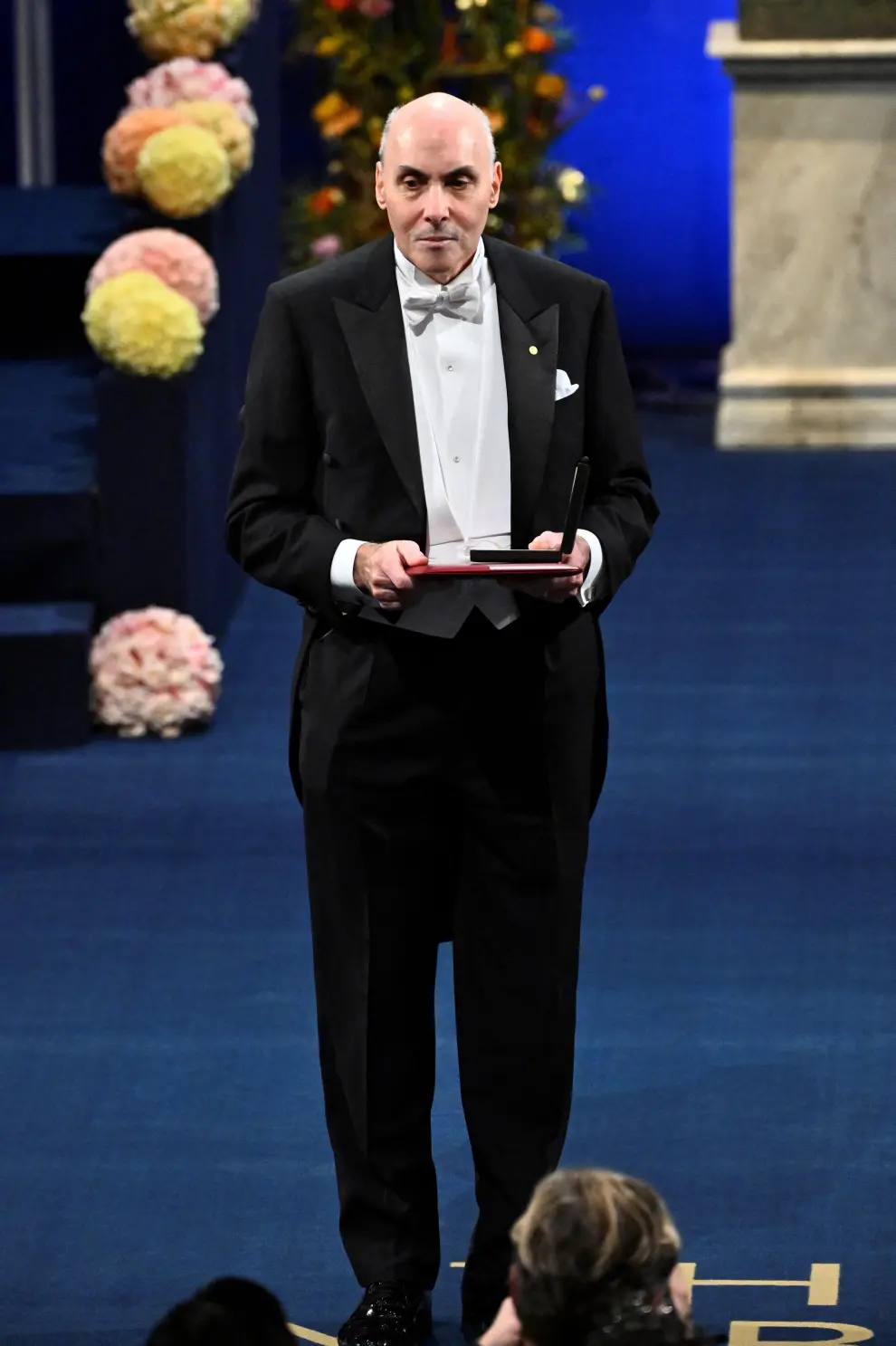 Stockholm (Sweden), 10/12/2023.- 2023 Nobel laureate in Chemistry Louis E. Brus during the Nobel Prize 2023 award ceremony at the Concert Hall in Stockholm, Sweden, 10 December 2023. (Suecia, Estocolmo) EFE/EPA/CLAUDIO BRESCIANI SWEDEN OUT
 SWEDEN NOBEL 2023 PRIZE CEREMONY