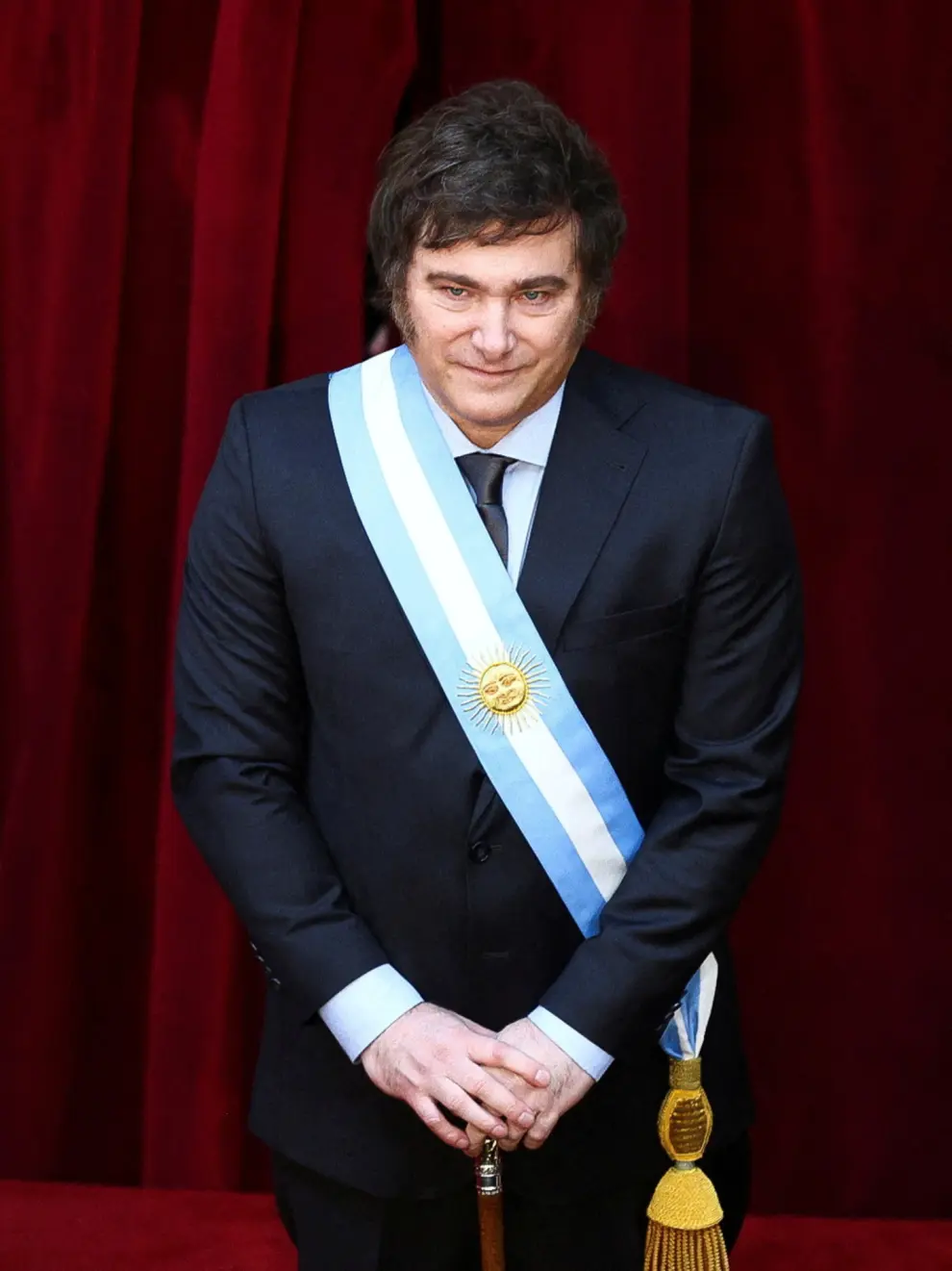Argentinas President Javier Milei wears the presidential sash after he was sworn in as Argentinas next president at the National Congress, in Buenos Aires, Argentina December 10, 2023. REUTERS/Matias Baglietto     TPX IMAGES OF THE DAY [[[REUTERS VOCENTO]]]