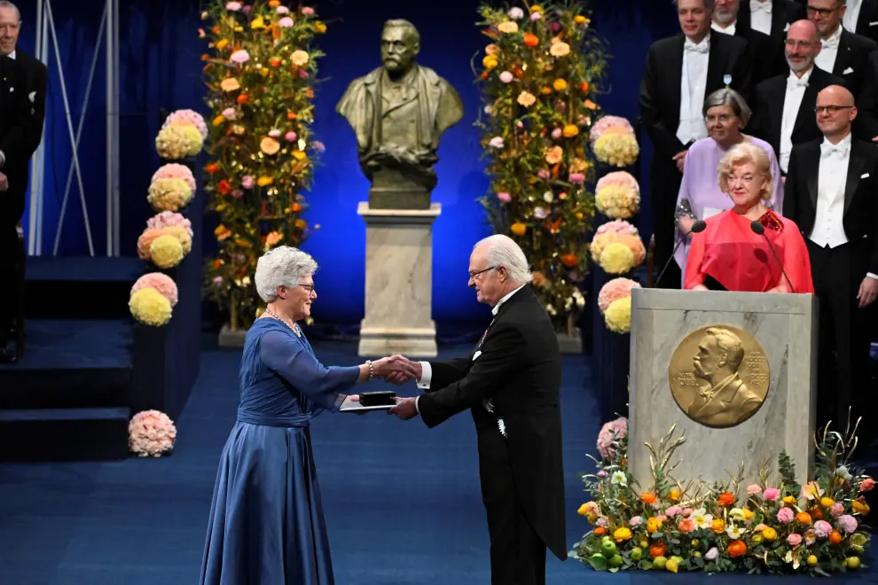Katalin Kariko is awarded the Nobel Prize in physiology or medicine 2023 by King Carl Gustaf of Sweden during the Nobel Prize award ceremony at the Concert Hall in Stockholm, Sweden on December 10, 2023. Claudio Bresciani/TT News Agency/via REUTERS      ATTENTION EDITORS - THIS IMAGE WAS PROVIDED BY A THIRD PARTY. SWEDEN OUT. NO COMMERCIAL OR EDITORIAL SALES IN SWEDEN. [[[REUTERS VOCENTO]]] NOBEL-PRIZE/