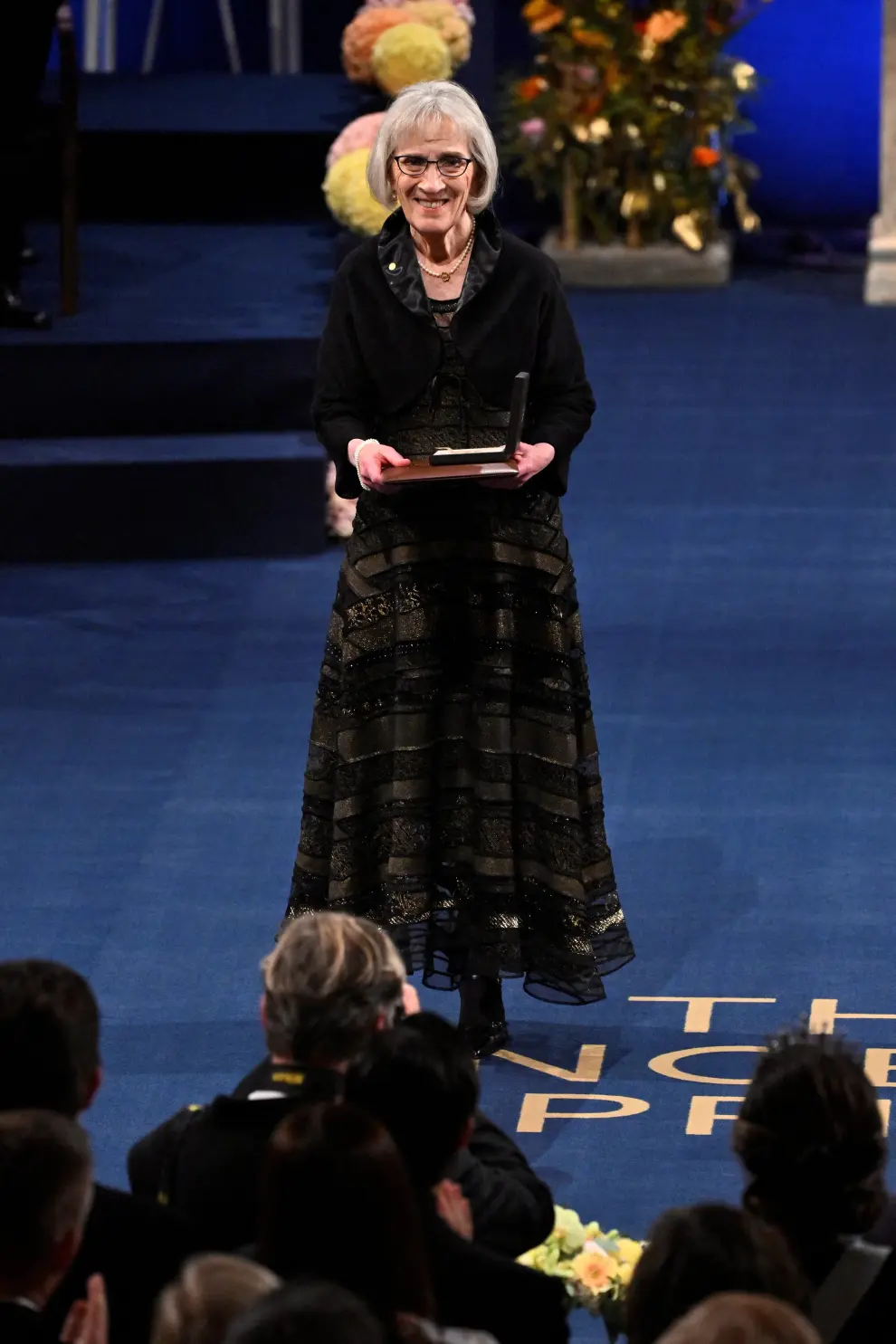 Claudia Goldin is awarded the Nobel Prize in Economic Sciences 2023 by King Carl Gustaf of Sweden during the Nobel Prize award ceremony in Stockholm, Sweden on December 10, 2023. Christine Olsson/TT News Agency/via REUTERS      ATTENTION EDITORS - THIS IMAGE WAS PROVIDED BY A THIRD PARTY. SWEDEN OUT. NO COMMERCIAL OR EDITORIAL SALES IN SWEDEN. [[[REUTERS VOCENTO]]] NOBEL-PRIZE/