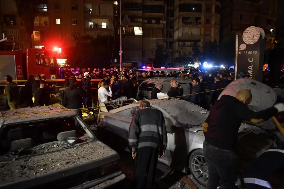 Beirut (Lebanon), 02/01/2024.- Damaged vehicles at the site of an explosion in the southern district of Dahiyeh, Beirut, Lebanon 2 January 2024. According to Lebanese state media, four people were killed in the explosion including Hamas deputy head, Saleh al Arouri. (Líbano) EFE/EPA/ABBAS SALMAN
