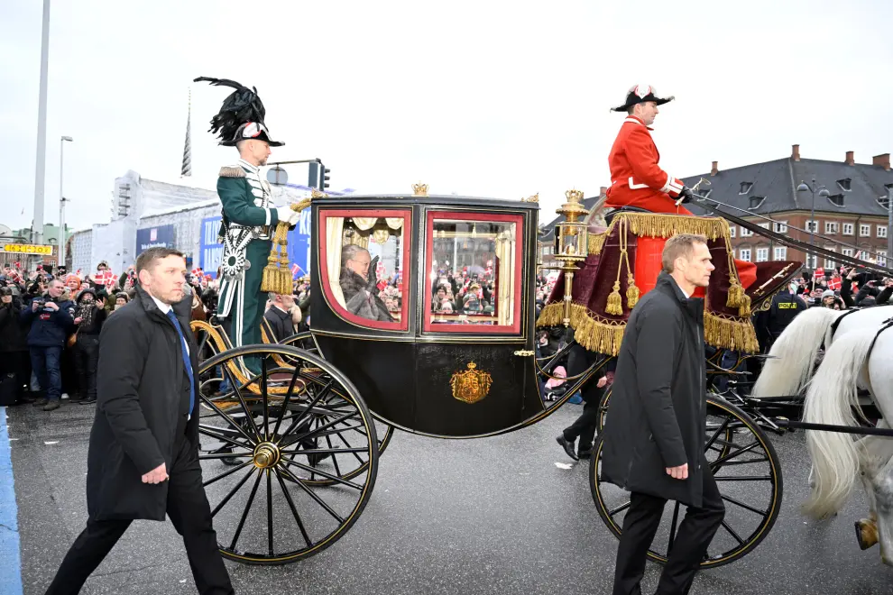 Denmarks Queen Margrethe rides in a carriage from Amalienborg Castle to Christiansborg Castle,  on the day she abdicates after a reign of 52 years and her elder son, Crown Prince Frederik, ascends the throne as King Frederik X in Copenhagen, Denmark, January 14, 2024. Ritzau Scanpix/Nils Meilvang via REUTERS    ATTENTION EDITORS - THIS IMAGE WAS PROVIDED BY A THIRD PARTY. DENMARK OUT. NO COMMERCIAL OR EDITORIAL SALES IN DENMARK. [[[REUTERS VOCENTO]]]