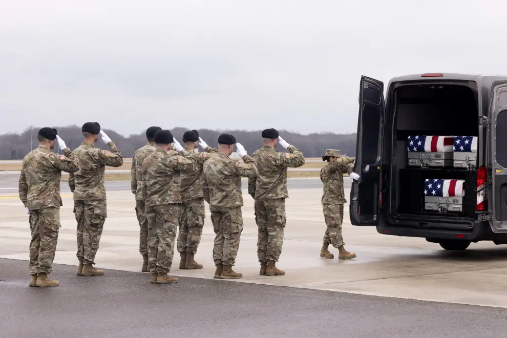 Dover (United States), 02/02/2024.- The doors of a vehicle are shut during the move of flag-draped transfer cases containing the remains of fallen US service members during a dignified transfer at Dover Air Force Base in Dover, Delaware, USA, 02 February 2024. US Army Sergeant Jerome Rivers. US Army Sergeant Breonna Moffett, and US Army Sergeant Kennedy Sanders died in a drone strike on 28 January at a military base in Jordan; forty other US troops were also injured in the attack. The enemy drone, which the White House has blamed on an Iran-backed militia, may have been mistaken for a US drone and left unimpeded, according to a preliminary report. (Jordania, Roma) EFE/EPA/MICHAEL REYNOLDS
 USA DOVER DIGNIFIED TRANSFER BIDEN