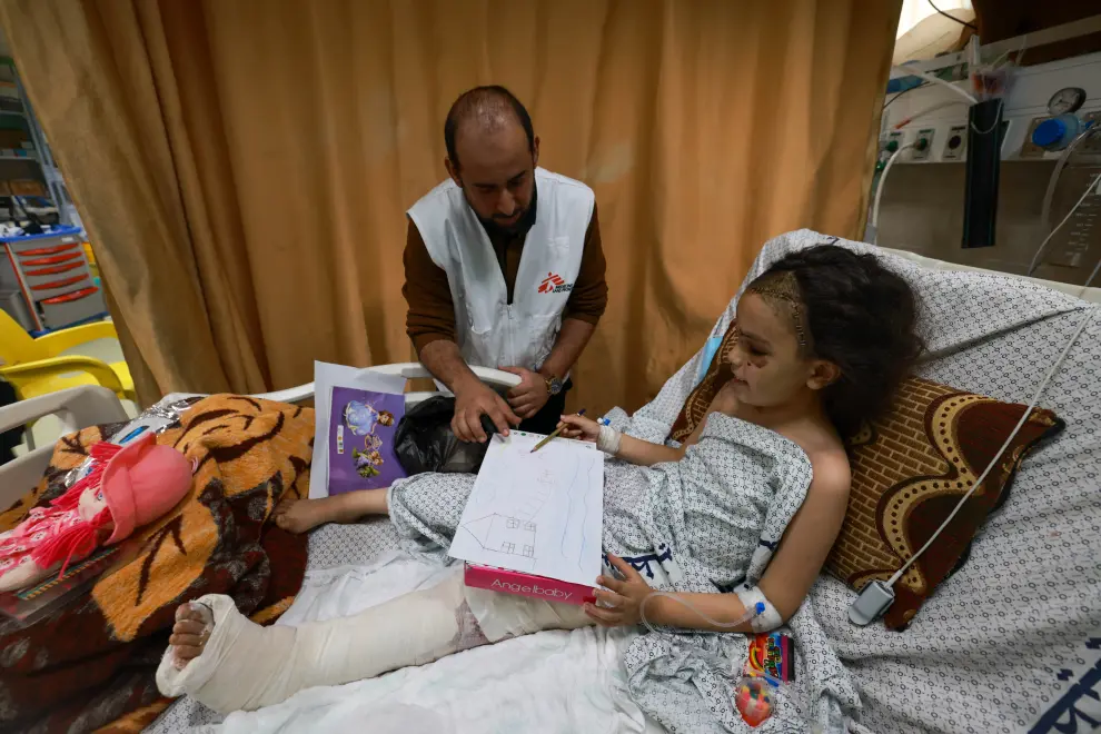 Razan Samer Shabet, lost her whole family in the bombing while she was injured. She has been in the hospital ever since. A distant uncle looks after her. She doesn't know her family have been killed.
Oral consent given by her uncle.