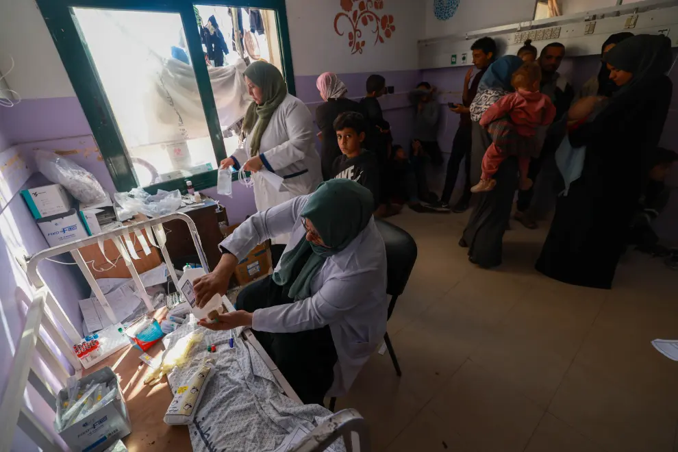 A patient receiving a new dressing at Al Aqsa hospital. 29 November 2023, Middle Area, Gaza.