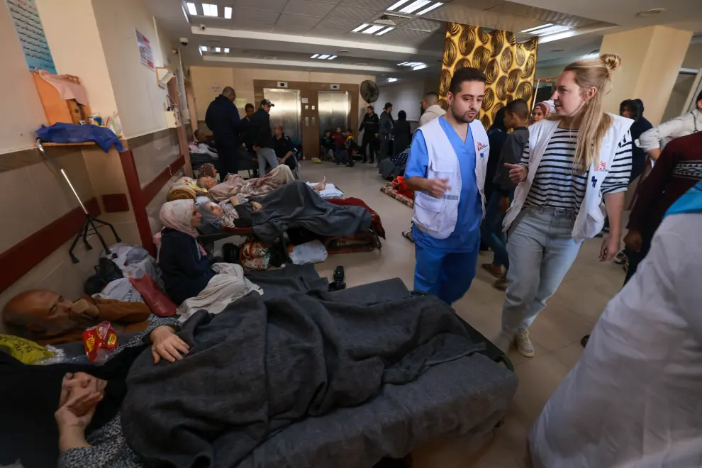 Nurse Katrien Claeys, PMR, checks on Islam Majdi Al Aydee at Al Aqsa hospital. 29 November 2023, Middle Area, Gaza.