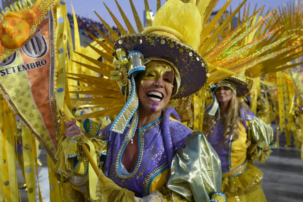 People attend the Carnival parade at the Sambadrome, in Rio de Janeiro, Brazil February 12, 2024. REUTERS/Tita Barros NO RESALES. NO ARCHIVES [[[REUTERS VOCENTO]]] BRAZIL-CARNIVAL/