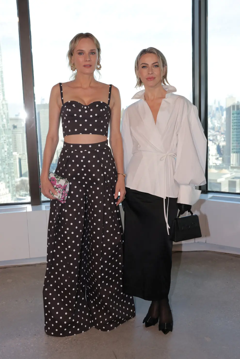 Diane Kruger and Julianne Hough attend the Carolina Herrera Fall/Winter 2024 collection show during New York Fashion Week, in New York City, U.S., February 12, 2024. REUTERS/Andrew Kelly [[[REUTERS VOCENTO]]]