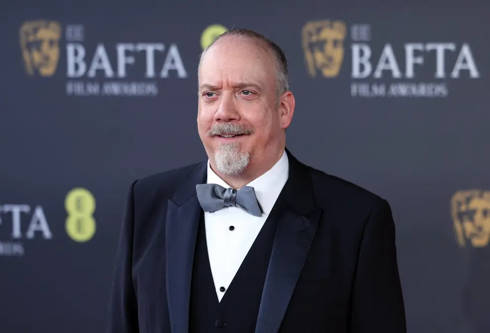 Paul Giamatt and Clara Wong arrive at the 2024 British Academy of Film and Television Awards (BAFTA) at the Royal Festival Hall in the Southbank Centre, London, Britain, February 18, 2024. REUTERS/Isabel Infantes [[[REUTERS VOCENTO]]] AWARDS-BAFTA/