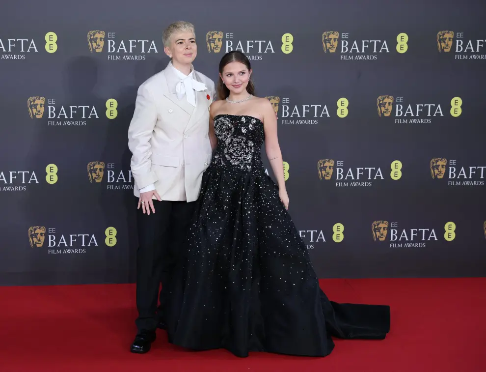 Paul Giamatti and Clara Wong arrive at the 2024 British Academy of Film and Television Awards (BAFTA) at the Royal Festival Hall in the Southbank Centre, London, Britain, February 18, 2024. REUTERS/Isabel Infantes [[[REUTERS VOCENTO]]] AWARDS-BAFTA/