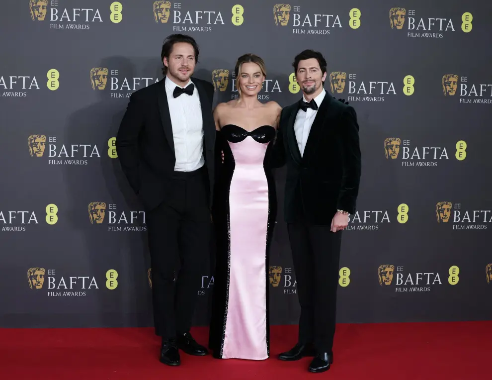Margot Robbie and her husband Tom Ackerley pose at the 2024 British Academy of Film and Television Awards (BAFTA) at the Royal Festival Hall in the Southbank Centre, London, Britain, February 18, 2024. REUTERS/Isabel Infantes [[[REUTERS VOCENTO]]] AWARDS-BAFTA/