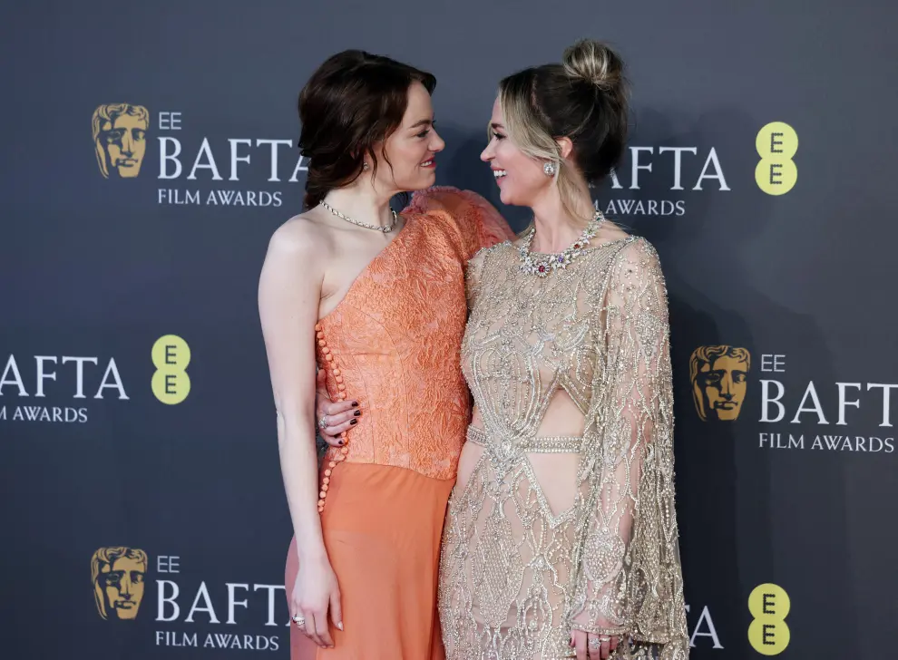 Emma Stone and Emily Blunt arrive at the 2024 British Academy of Film and Television Awards (BAFTA) at the Royal Festival Hall in the Southbank Centre, London, Britain, February 18, 2024. REUTERS/Isabel Infantes [[[REUTERS VOCENTO]]] AWARDS-BAFTA/