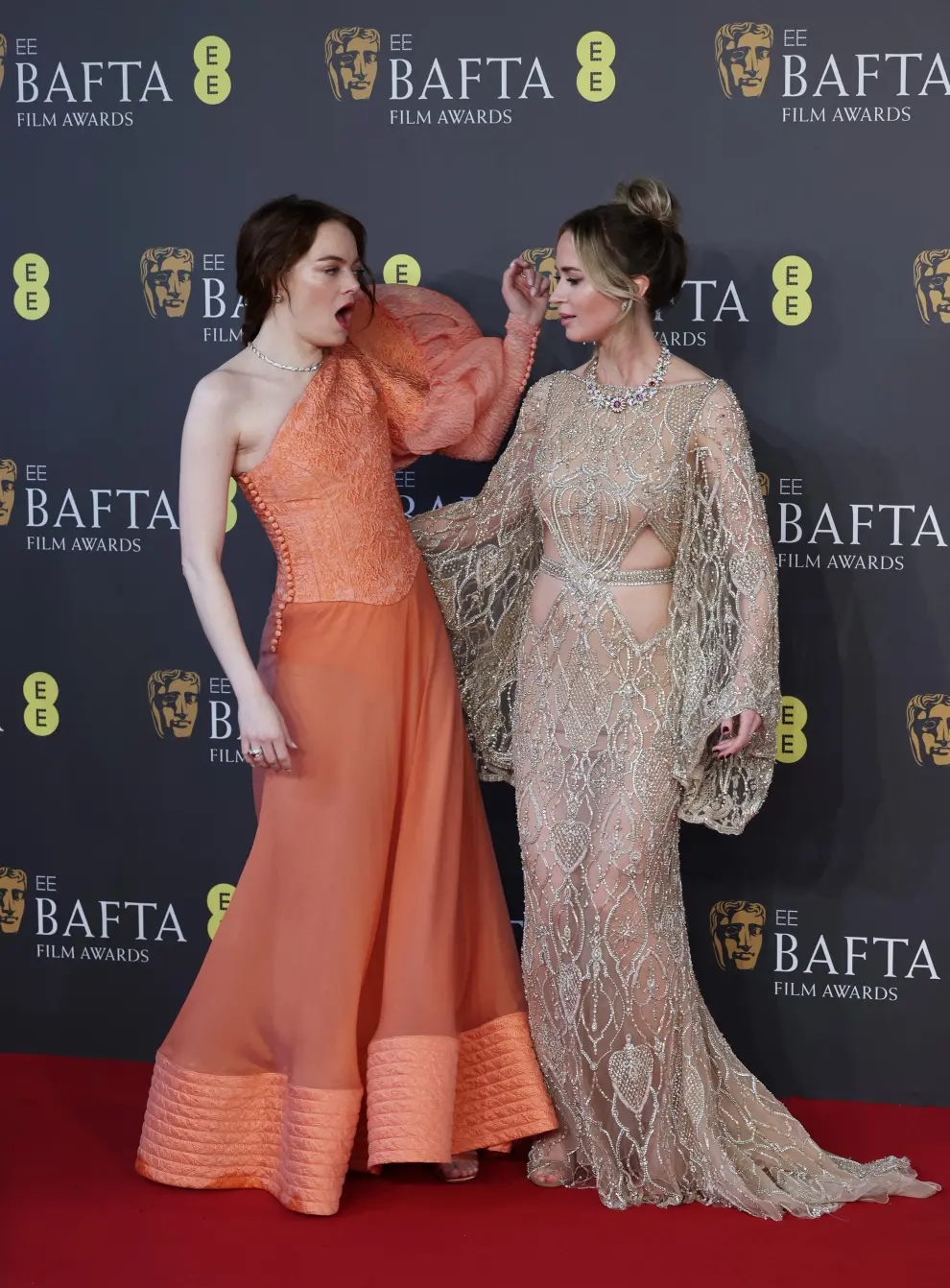 Emma Stone and Emily Blunt arrive at the 2024 British Academy of Film and Television Awards (BAFTA) at the Royal Festival Hall in the Southbank Centre, London, Britain, February 18, 2024. REUTERS/Isabel Infantes [[[REUTERS VOCENTO]]] AWARDS-BAFTA/