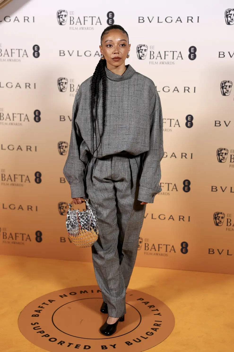 Teo Yoo poses for photographers upon arrival for the BAFTA Nominees Party in London, Saturday, Feb. 17, 2024 (Photo by Vianney Le Caer/Invision/AP) [[[AP/LAPRESSE]]]
