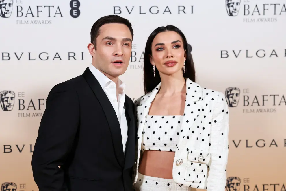 Ed Westwick and Amy Jackson pose as they arrive at the Nominees Party for 2024 BAFTA Film Awards, supported by Bulgari, at the National Gallery in London, Britain, February 17, 2024. REUTERS/Isabel Infantes [[[REUTERS VOCENTO]]] AWARDS-BAFTA/NOMINEES-PARTY