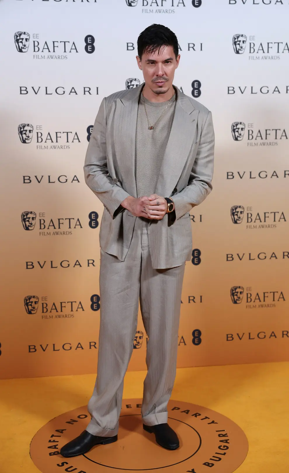 Lewis Tan poses as he arrives at the Nominees Party for 2024 BAFTA Film Awards, supported by Bulgari, at the National Gallery in London, Britain, February 17, 2024. REUTERS/Isabel Infantes [[[REUTERS VOCENTO]]] AWARDS-BAFTA/NOMINEES-PARTY