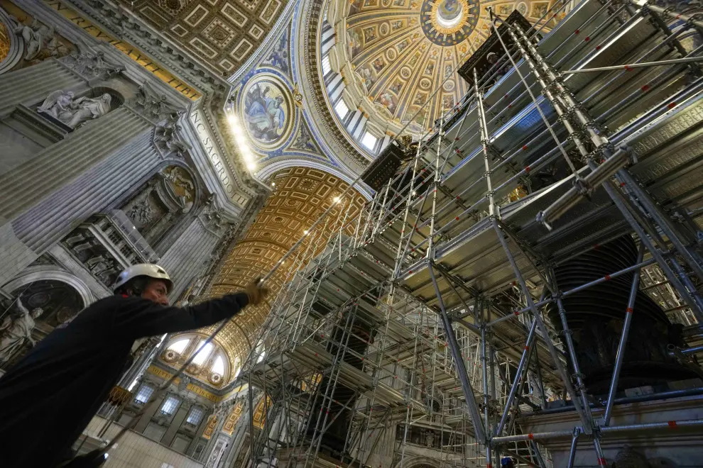 Workmen mount scaffolding around the 17th century, 95ft-tall bronze canopy by Giovan Lorenzo Bernini surmounting the papal Altar of the Confession in St. Peters Basilica at the Vatican, Wednesday, Feb. 21, 2024. Works have started for year-long, 700,000 euro restoration of the monumental baldacchino, or canopy, of St. Peters Basilica, pledging to complete the first comprehensive work on Berninis masterpiece in 250 years before Pope Francis big 2025 Jubilee. (AP Photo/Andrew Medichini)..Associated Press/LaPresse.Only Italy and Spain [[[AP/LAPRESSE]]]