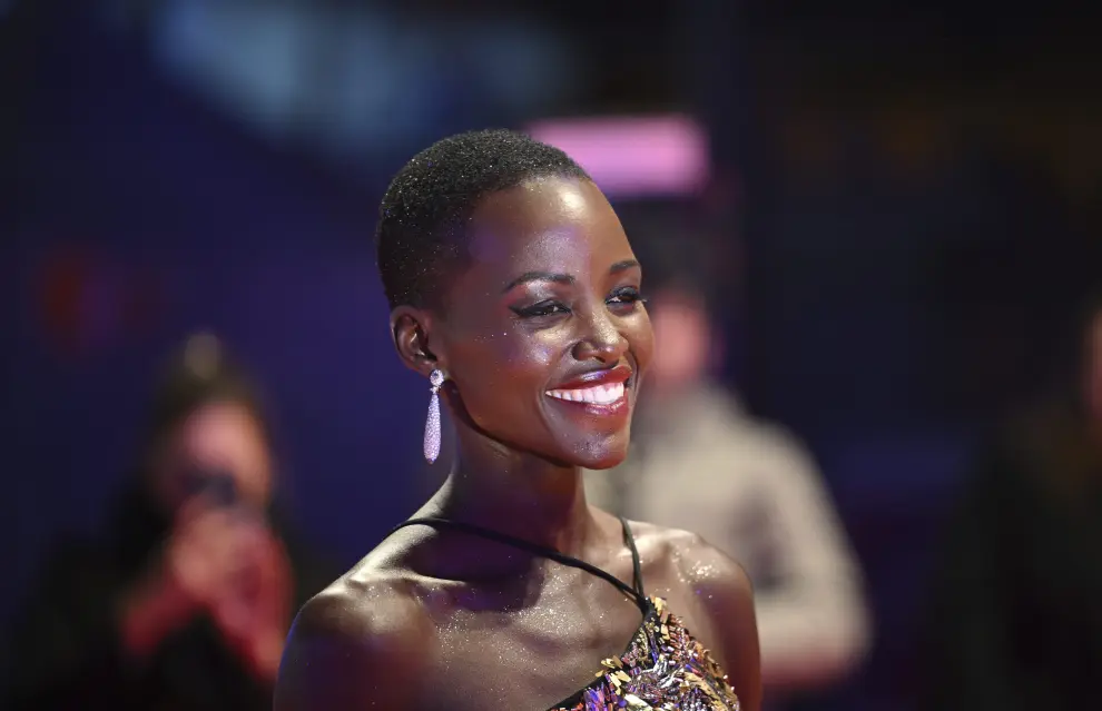 The president of the International Jury Lupita Nyongo stands on the red carpet outside the Berlinale Palast prior to the award ceremony at the International Film Festival, Berlinale, in Berlin, Saturday, Feb. 24, 2024. (AP Photo/Markus Schreiber) [[[AP/LAPRESSE]]]