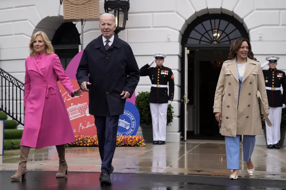 President Joe Biden, center, first lady Jill Biden, left, and Vice President Kamala Harris, right, attend the White House Easter Egg Roll on the South Lawn of the White House, Monday, April 1, 2024, in Washington. (AP Photo/Evan Vucci)