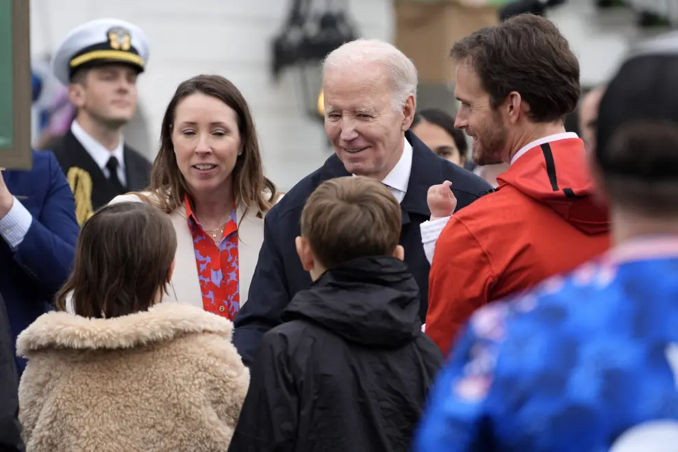 President Joe Biden, center, greets guests at the White House Easter Egg Roll on the South Lawn of the White House, Monday, April 1, 2024, in Washington. (AP Photo/Evan Vucci)