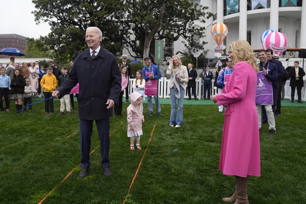 President Joe Biden, left, and first lady Jill Biden, right, participate in the White House Easter Egg Roll on the South Lawn of the White House, Monday, April 1, 2024, in Washington. (AP Photo/Evan Vucci)