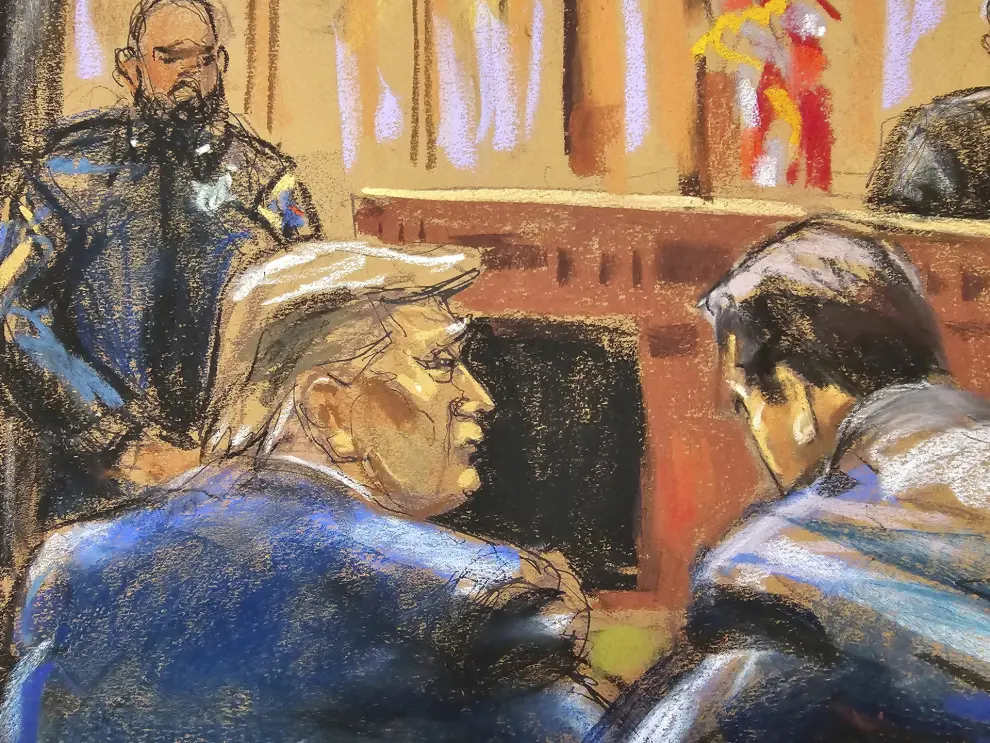 In this courtroom sketch, former U.S. President Donald Trump, left, sits with his attorney Todd Blanche, before Justice Juan M. Merchan, at the beginning of his trial in a Manhattan criminal court in New York, Monday, April 15, 2024. Trump arrived at a New York court for the start of jury selection in his hush money trial, making history as the first former president to stand trial on criminal charges. (Jane Rosenberg/Pool Photo via AP)