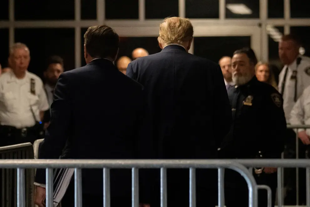 Former U.S. President Donald Trump at Manhattan criminal court in New York, U.S., on Monday, April 15, 2024. Jury selection begins Monday in Trumps criminal trial where he faces 34 felony counts of falsifying business records as part of an alleged scheme to silence claims of extramarital sexual encounters during his 2016 presidential campaign.  Jeenah Moon/Pool via REUTERS [[[REUTERS VOCENTO]]]