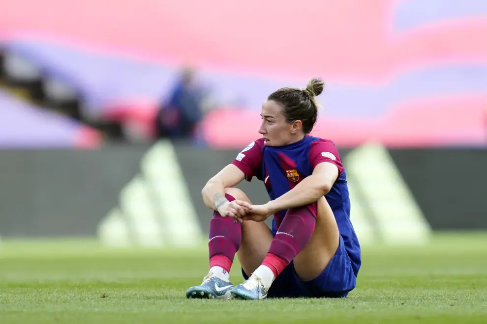 Barcelona's Lucy Bronze reacts at the end of the women's Champions League semifinals, first leg, soccer match between FC Barcelona and Chelsea FC at the Olympic Stadium, in Barcelona, Spain, Saturday, April 20, 2024. Chelsea won 1-0. (AP Photo/Jose Breton)