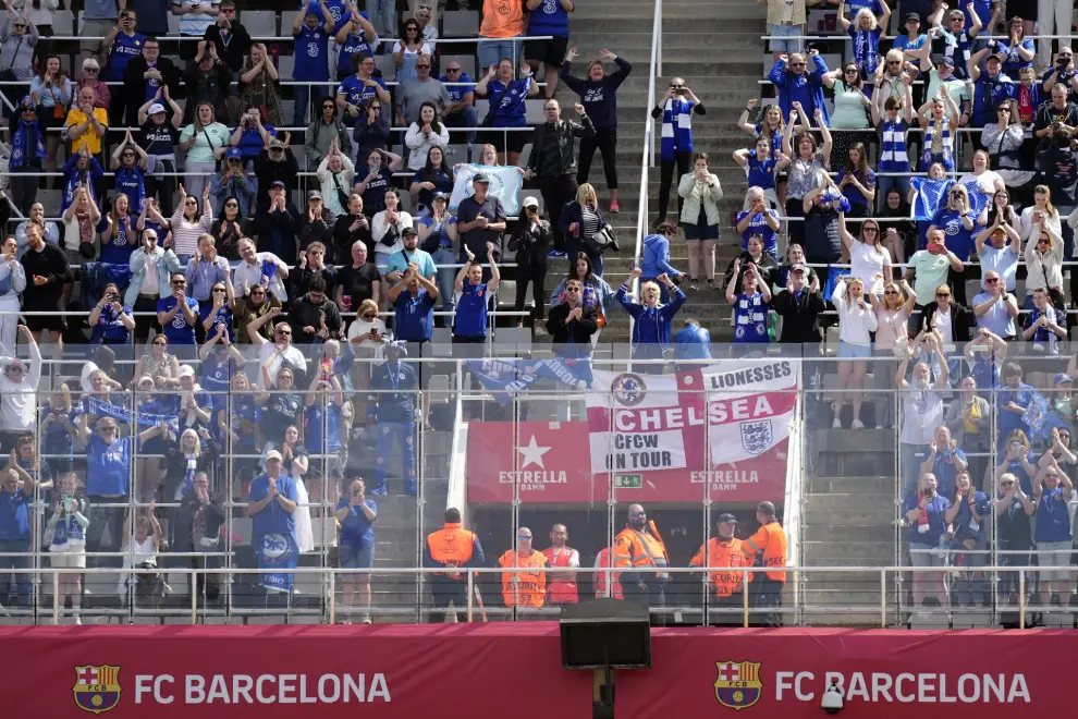 Chelsea supporters celebrate at the end of the women's Champions League semifinals, first leg, soccer match between FC Barcelona and Chelsea FC at the Olympic Stadium, in Barcelona, Spain, Saturday, April 20, 2024. Chelsea won 1-0. (AP Photo/Jose Breton)