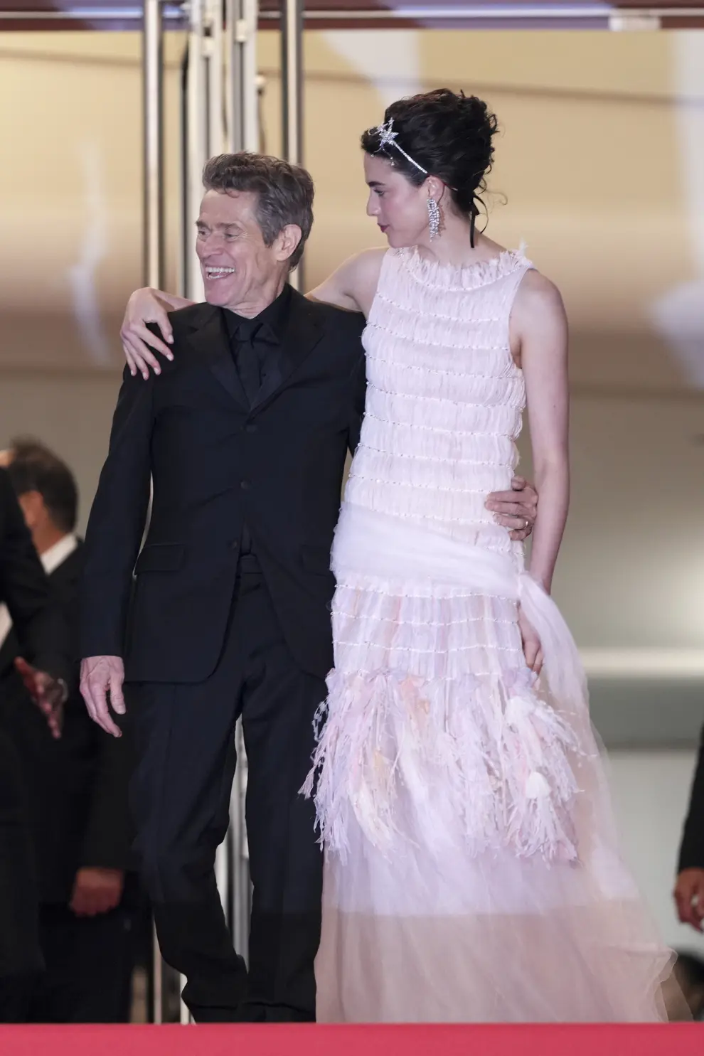Willem Dafoe, left, and Margaret Qualley pose for photographers upon departure from the premiere of the film 'Kinds of Kindness' at the 77th international film festival, Cannes, southern France, Friday, May 17, 2024. (Photo by Scott A Garfitt/Invision/AP)