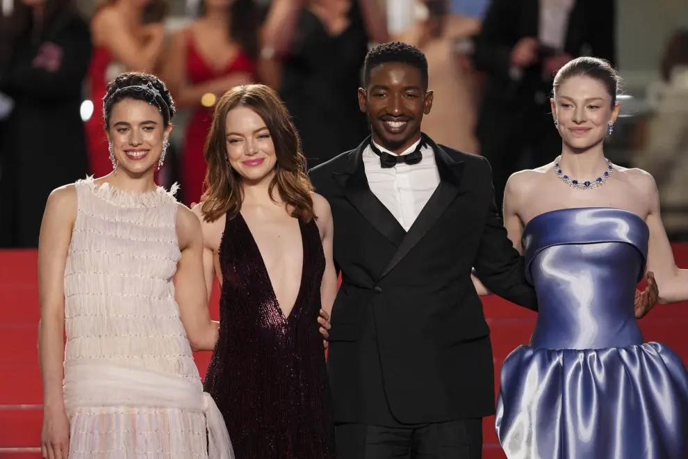 Margaret Qualley, from left, Emma Stone, Mamoudou Athie, and Hunter Schafer pose for photographers upon departure from the premiere of the film 'Kinds of Kindness' at the 77th international film festival, Cannes, southern France, Friday, May 17, 2024. (Photo by Scott A Garfitt/Invision/AP)