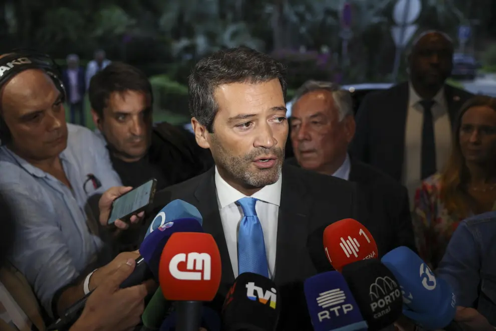 Lisbon (Portugal), 16/10/2020.- Chega (CH) President Andre Ventura (C), accompanied by the Party candidate Antonio Tanger Correa (C-R) speaks to the media on their arrival for the electoral night in Lisbon, Portugal, 09 June 2024. More than 10.8 million registered voters in Portugal and abroad go to the polls today to choose 21 of the 720 members of the European Parliament. (Elecciones, Lisboa) EFE/EPA/MIGUEL A. LOPES
