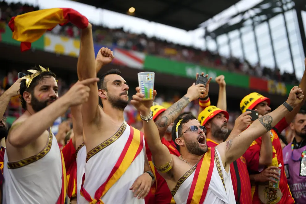 Fans cheer before the start of a round of sixteen match between Spain and Georgia at the Euro 2024 soccer tournament in Cologne, Germany, Sunday, June 30, 2024. (AP Photo/Manu Fernandez)