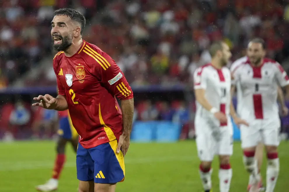 Spain's Dani Carvajal reacts during a round of sixteen match between Spain and Georgia at the Euro 2024 soccer tournament in Cologne, Germany, Sunday, June 30, 2024. (AP Photo/Darko Vojinovic)