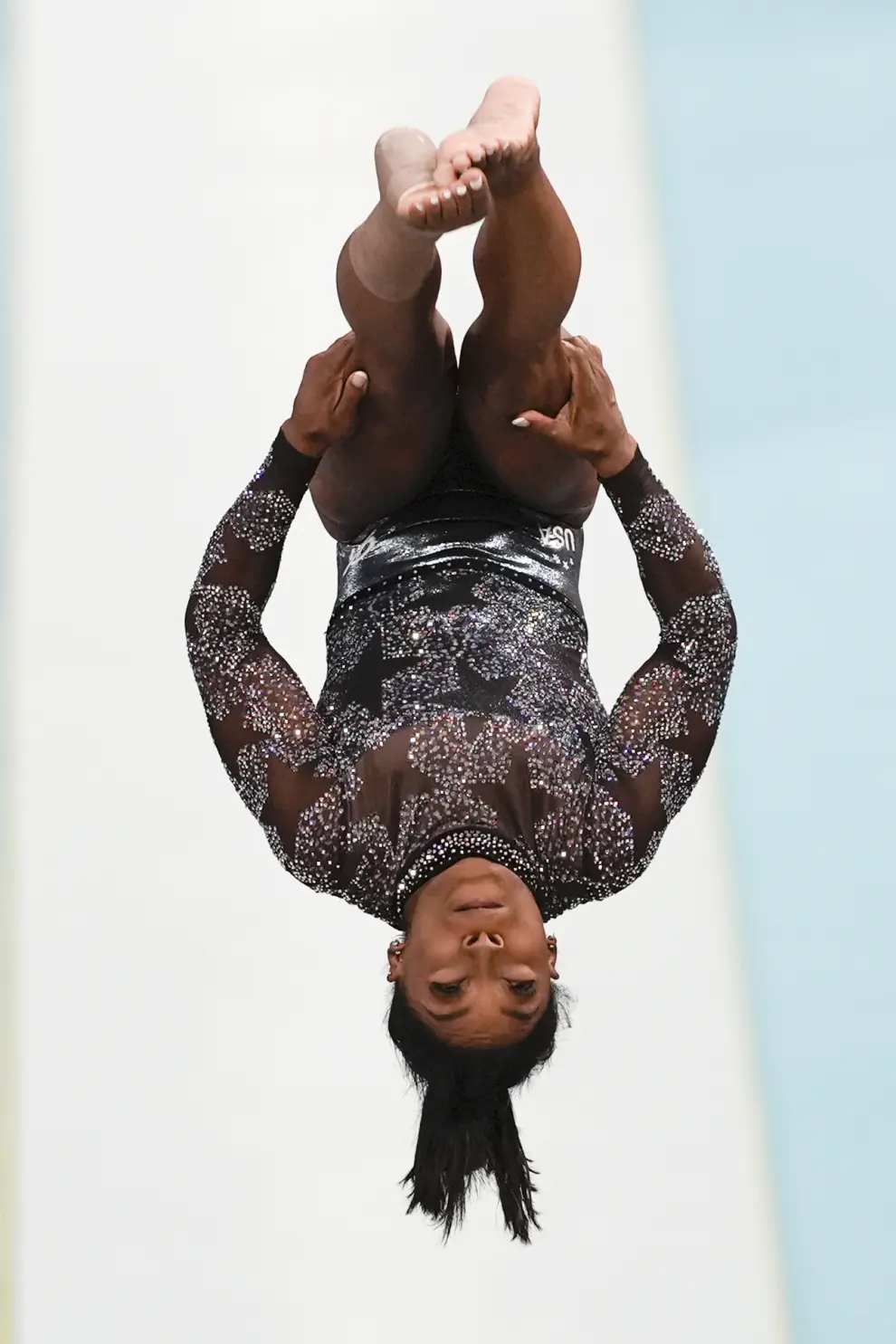 Simone Biles, of United States, competes on the vault during a women's artistic gymnastics qualification round at Bercy Arena at the 2024 Summer Olympics, Sunday, July 28, 2024, in Paris, France. (AP Photo/Francisco Seco)